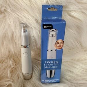 White Vibrating Under Eye Massager